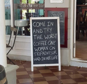 Worst coffee comment on blackboard in front of a cafe